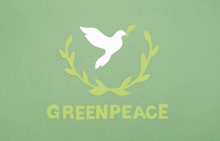 Vibrant illustration of modern Chinese e commerce boxes made from recycled paper stacked in a warehouse with green leaves and recycling symbols evoking sustainability and efficiency