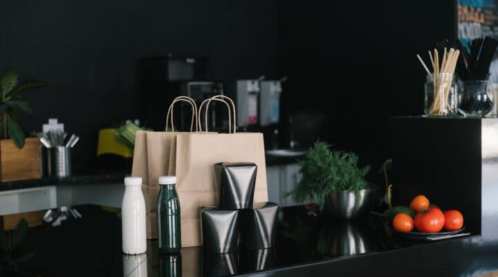 collage of modern sustainable packaging including paper boxes bioplastic films and recyclable mailers with eco icons