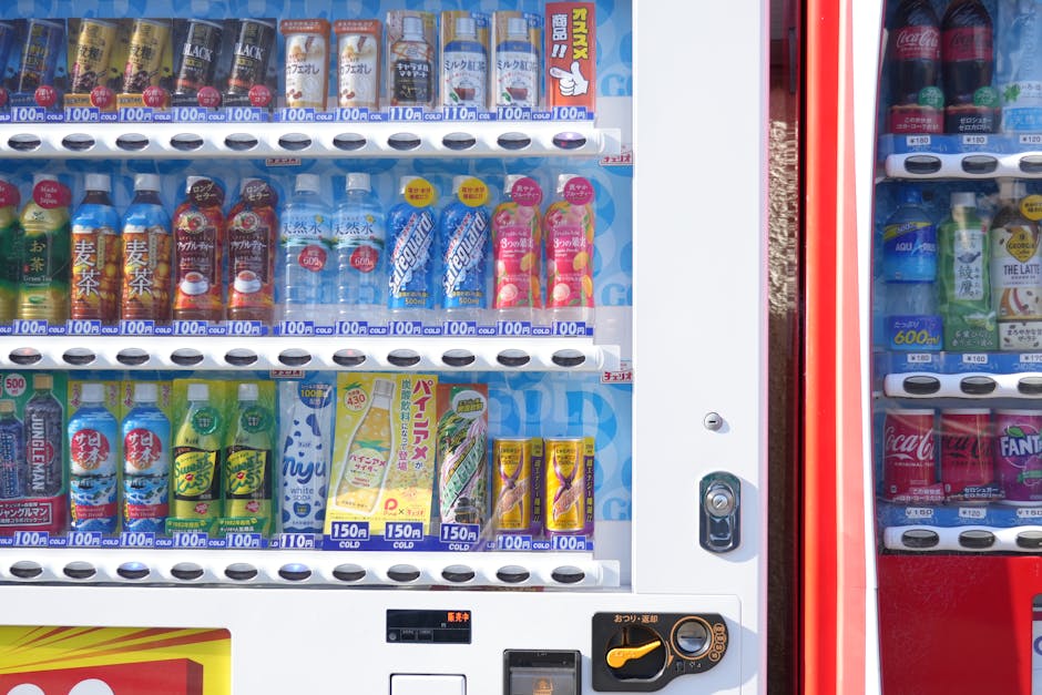 Close up of a young urban professional grabbing a branded coffee pouch from a street vending machine surrounded by skyscrapers and diverse commuters highlighting convenience and branding Close up of a young urban professional grabbing a branded coffee pouch from a street vending machine surrounded by skyscrapers and diverse commuters highlighting convenience and branding