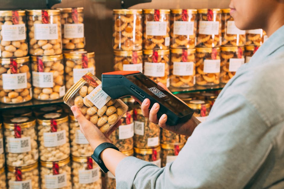 Smart packaging in action—pouch with embedded freshness indicator changing color smartphone scanning QR code displaying shelf life data and supply chain traceability